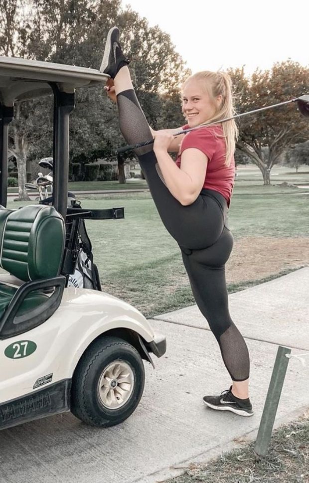 Sexy blonde stretching her amazing legs and ass