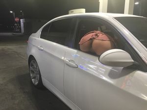 MY MOM paying for GAS at the station.