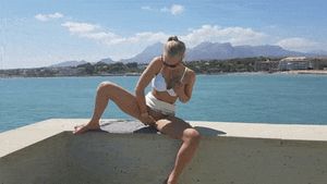 Hot blonde masturbating in public