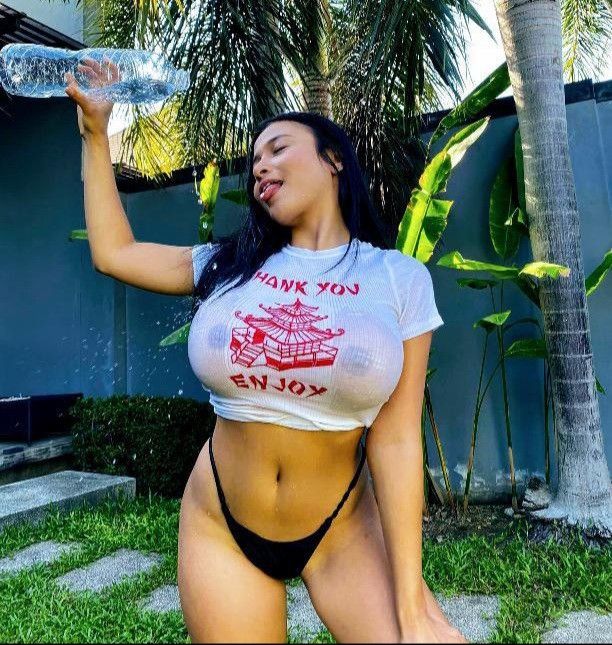 pours water on big tits
