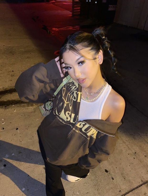 Hot asian posing outside