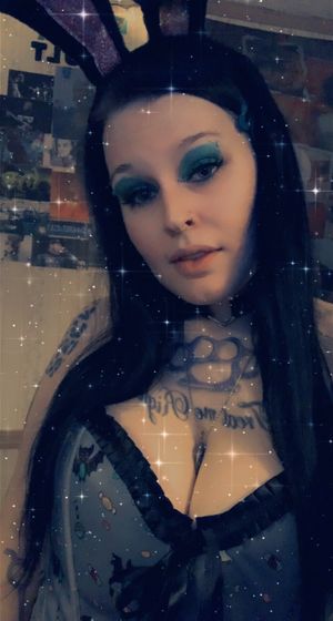 Sexy goth bunny with big tits in a corset