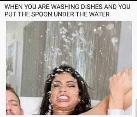 When You Are Washing Dishes And You Put The Spoon Under The Water