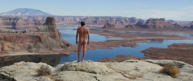 nude male admiring the view