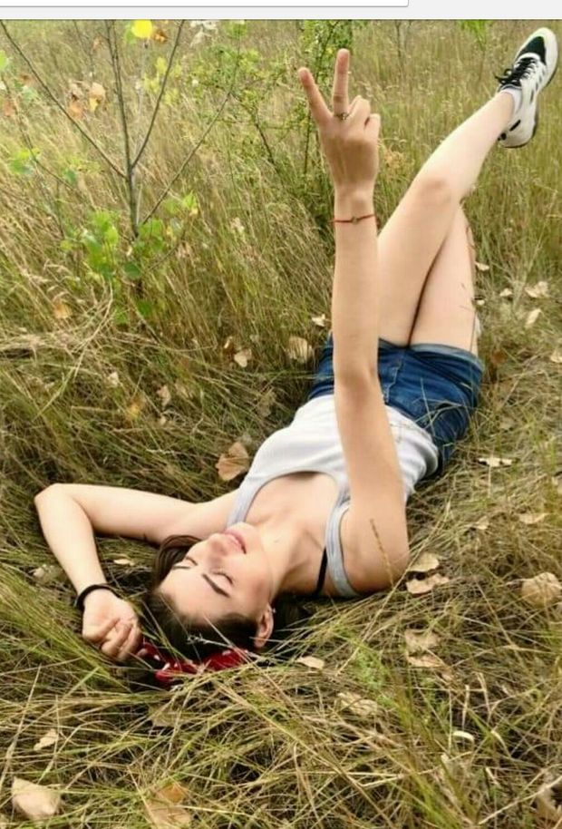 perfect babe with beautiful body & legs in denim shorts very sexy posing on nature