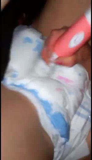 Jessica masturbates in her wet diapers like a big baby