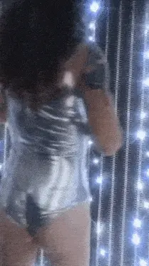 She’s dancing in a daze, mesmerized by the shine