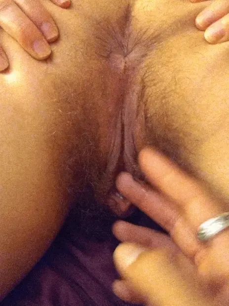 Showing off how wet their pussy is