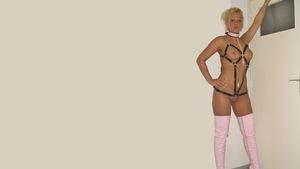 Kleine Lilly with pink thigh high boots and collar
