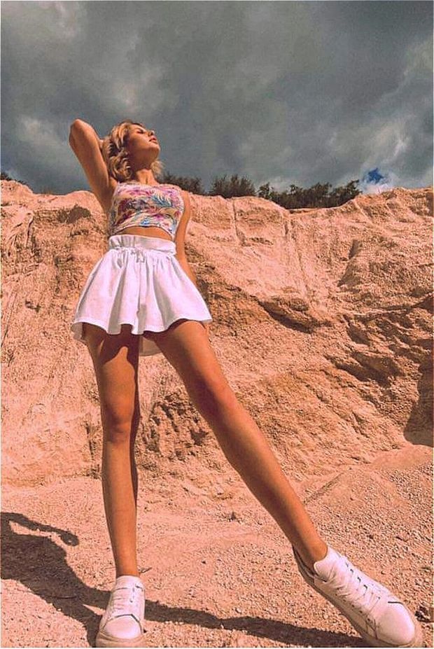 perfect babe in miniskirt with beautiful body & legs very sexy posing in public on nature