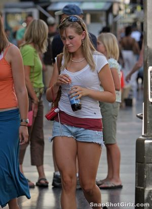 Blonde with short skirt on street