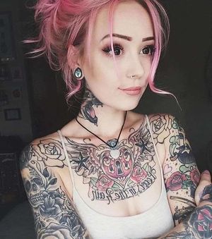 tattooed beauty with pink hair