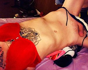 Sexy tattooed femboy