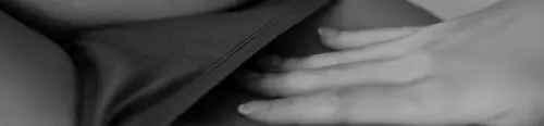 Sliding her hand under her panties