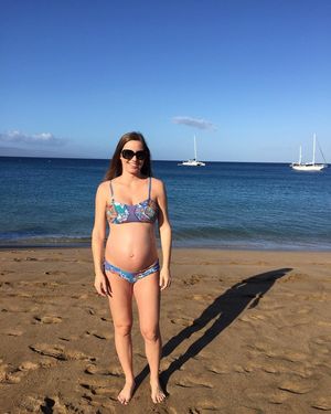 Pregnant wife on the beach