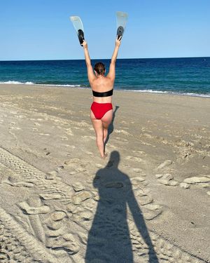 Sexy brunette teen in a bikini 5