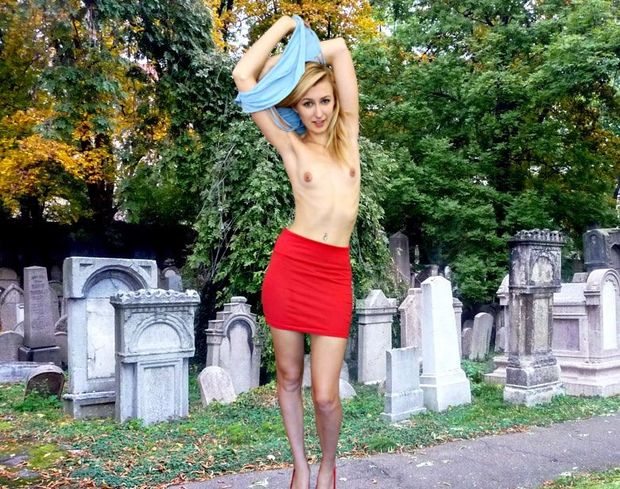 perfect skinny babe in red miniskirt topless in cemetery