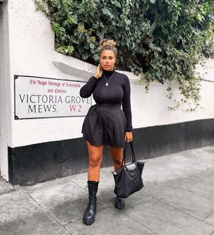 Slutty ebony bimbo shows her nipples