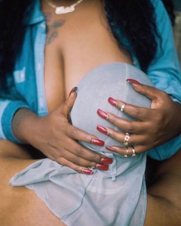 Caress my head while I suck on your breasts.