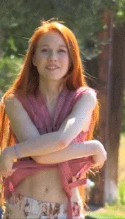 Gorgeous redhead taking it off in public