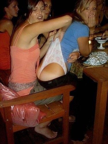 Giving her friend a wedgie