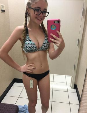 Wannabe model trying on new fashion