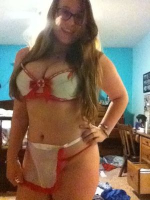 Curvy redhead dressed as a nurse