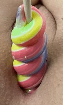 Close up of me pulling a candy out of my pussy