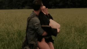 Army man hunting civilian woman in the fields
