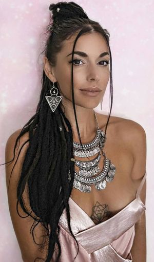 Spiritual chick with a little areola showing.