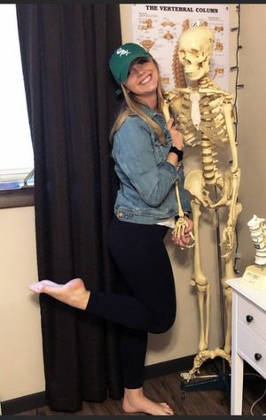 Cute babe with an ass wearing leggings standing next to her friend.