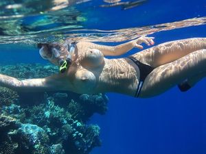 Swimming with Tits Out