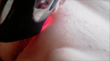 Watching a busty milf vibrating her pussy on my couch