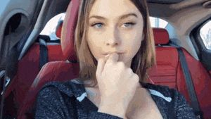 Fingering herself in the car
