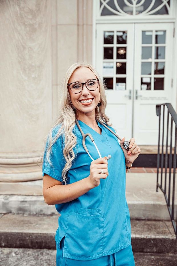 Hot blonde nurse in scrubs