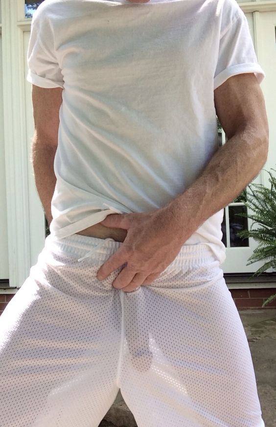 Cock in see through white shorts