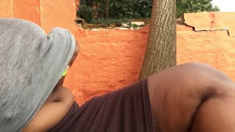 Milkshake Samme sitting outside, rubbing her titties and minding her business.