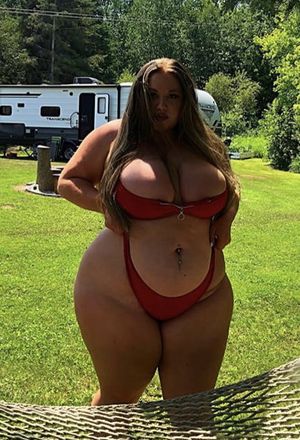 Busting Out Of Her Red Bikini