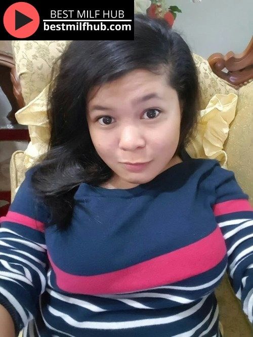 Big boobs Asian mom taking selfie