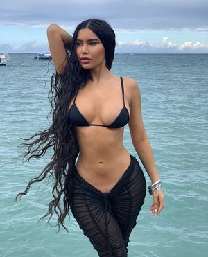 Hot fit Latina beauty at the beach