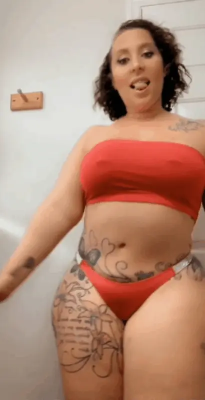 Thunda dancing in red bikini