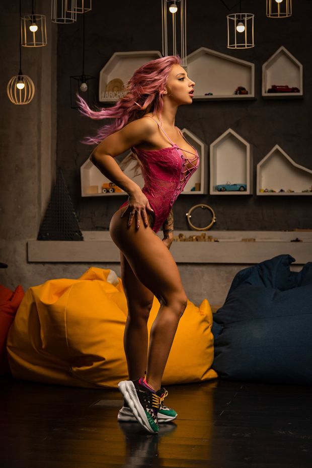 Bimbo in pink lingerie and sneakers