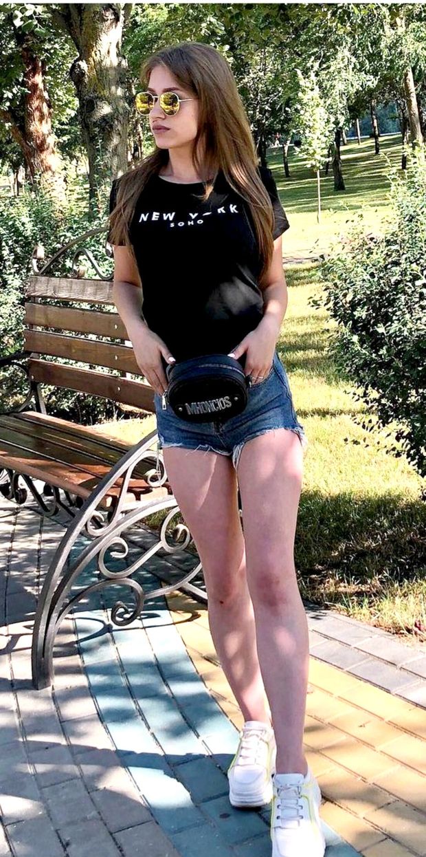perfect skinny babe with beautiful body & legs in denim shorts very sexy posing in public on nature