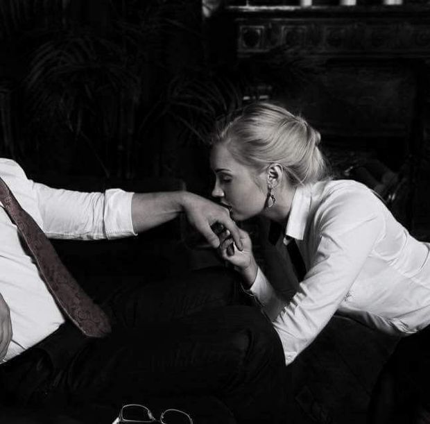 slave kisses Master's hand