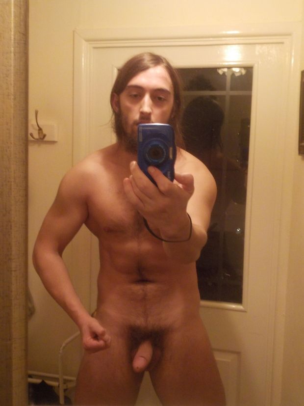 Posing in mirror with an erection