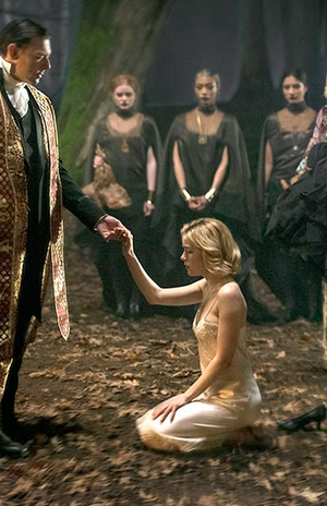 Sabrina submits to Father Blackwood as her coven watches.