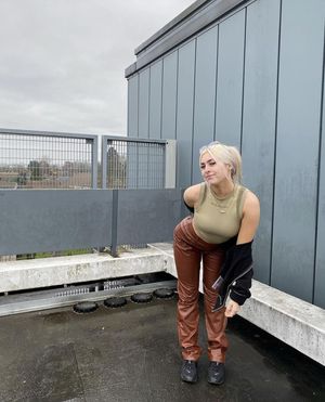 Slutty blonde with pierced nipples waiting to get fucked in public