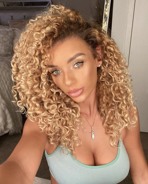 Gorgeous curly haired Jena Frumes cleavage