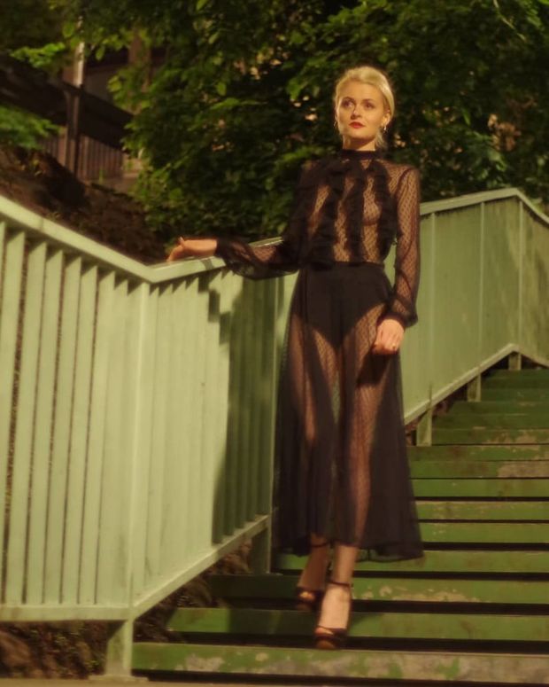 Sexy blonde hottie walking braless outdoors in long sheer dress and black stiletto sandals