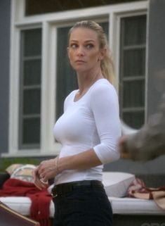 AJ Cook in a tight white shirt